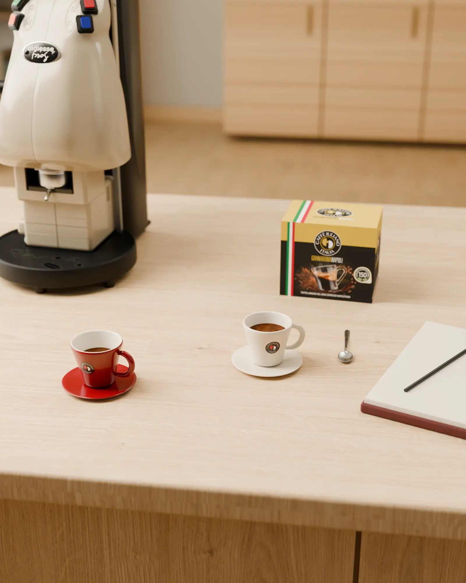 The desk: Warm ivory at the edge of a wooden desk, two cups and a notebook in focus. 3D espresso machine model for Caffè Iuliano, Pluton Studio