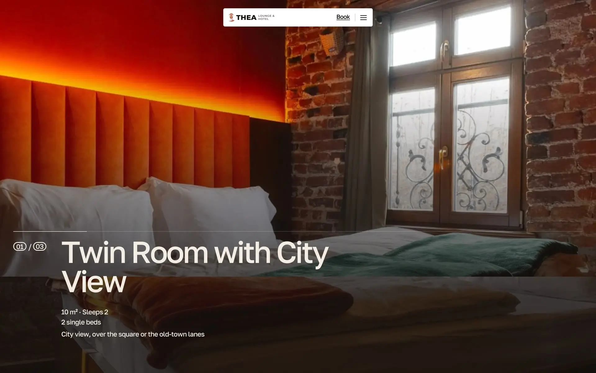 The rooms on theahotel.com: the Twin Room with City View, a velvet headboard lit orange against old brick, then the Deluxe Double and the Family Room wiping up over it